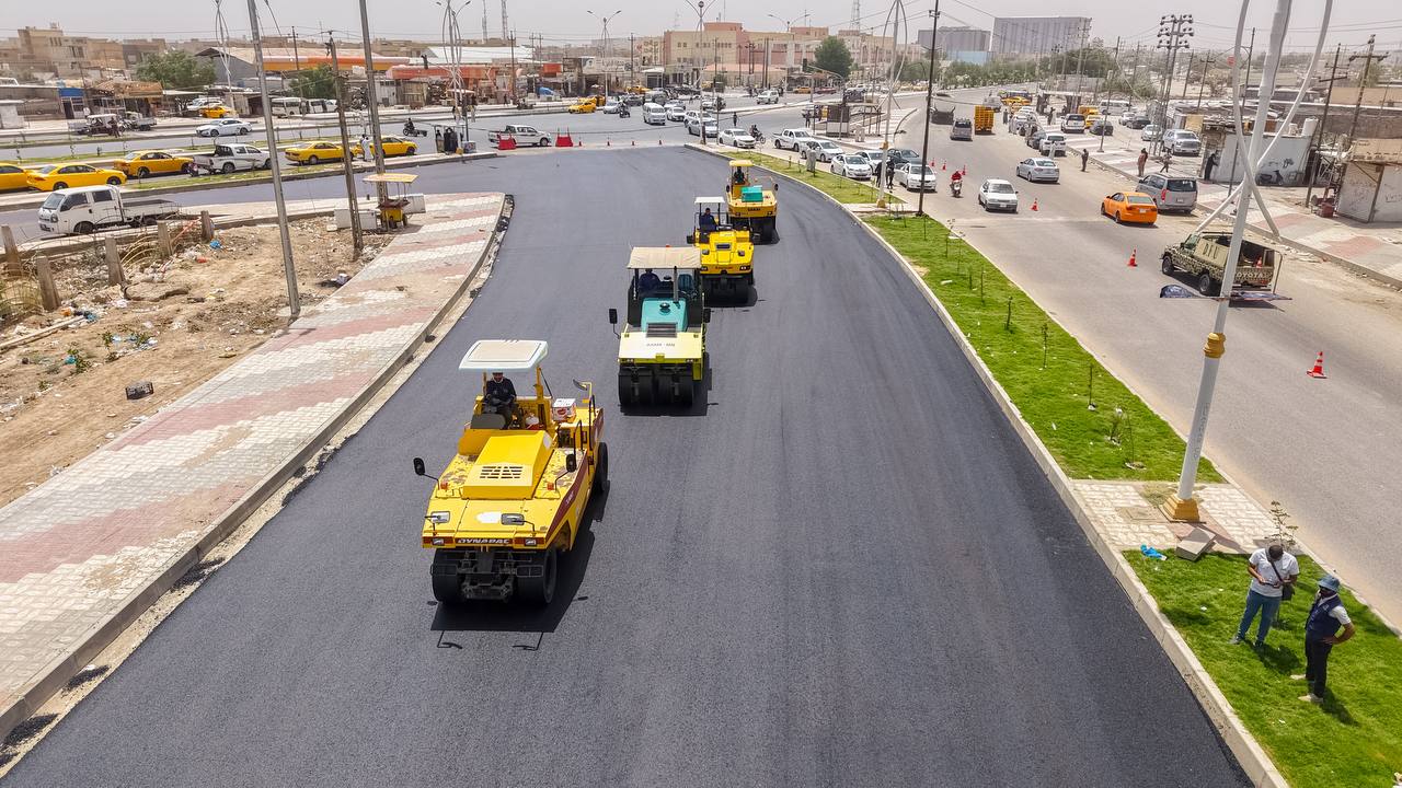 Aerial view of AAE road paving and compaction works with landscaped median